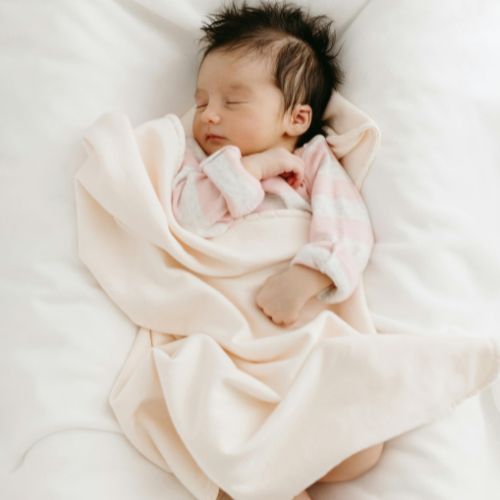 Why Organic Fabrics Matter for Your Baby’s Sleep